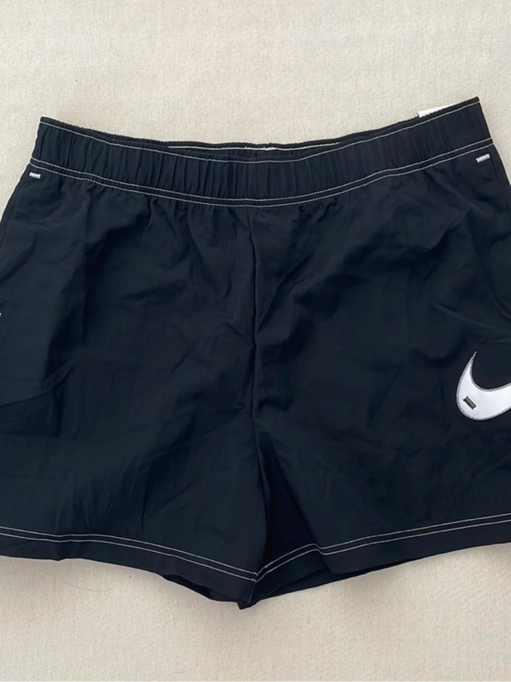 Nike Women's Black Athletic Shorts with White Swoosh Accent